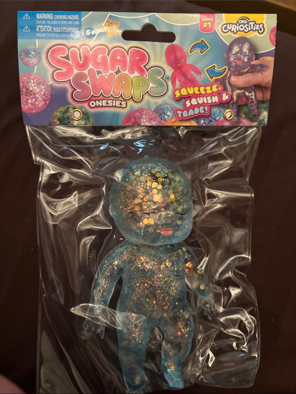 Onesies Glitter Blue Squeeze Figure by